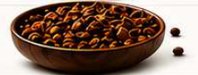 Cocoa husk in a wooden bowl